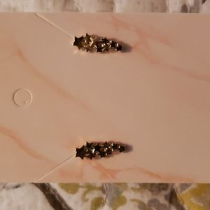 Gold shooting stars earrings